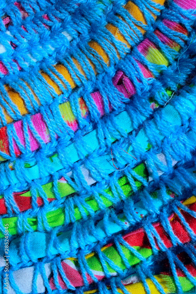 Abstract colorful background. Blue texture background with a lot of copy space for text. handmade knitted product, blue colors. 