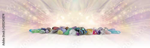 фотографія The Magical Energy of Earth's Crystals - wide row of different coloured healing