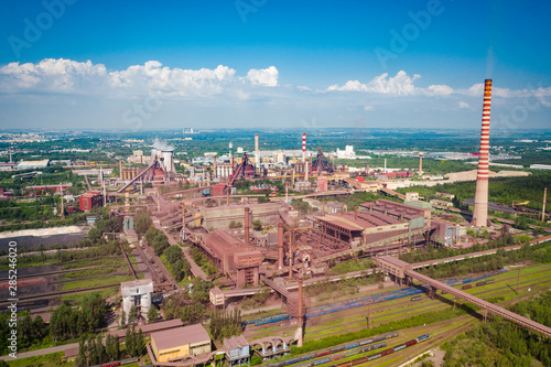 Industrial landscape with heavy pollution produced by a large factory © kbarzycki