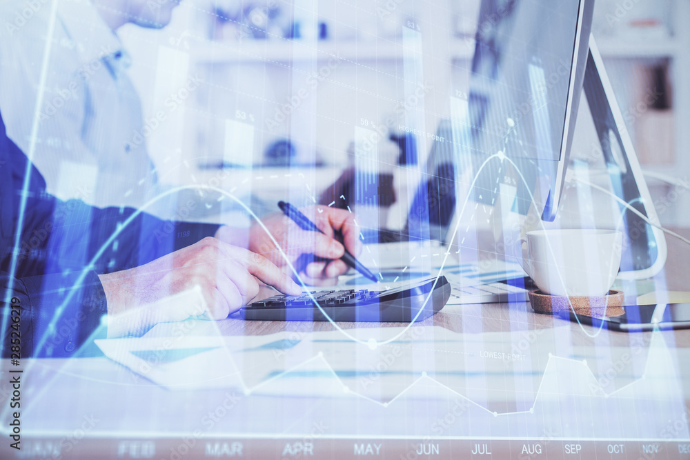 Forex graph with businessman working on computer in office on background. Concept of hardworking. Closeup. Multi exposure. Forex graph with businessman working on computer in office on background. Concept of hardworking. Closeup. Multi exposure.