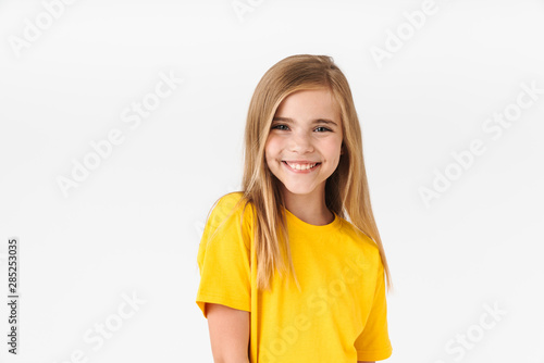 Portrait of beautiful blonde summer girl wearing casual t-shirt smiling at camera