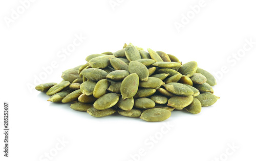 pumpkin seeds on white background.
