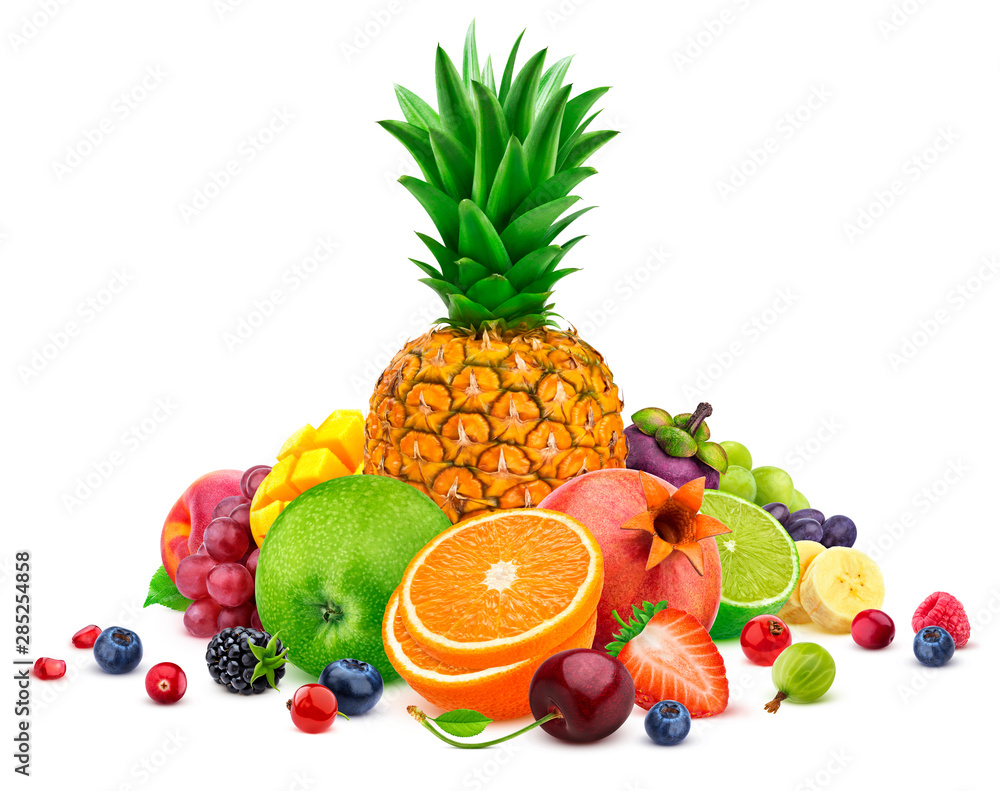 Heap of different whole and sliced tropical fruits isolated on white background with clipping path Heap of different whole and sliced tropical fruits isolated on white background with clipping path