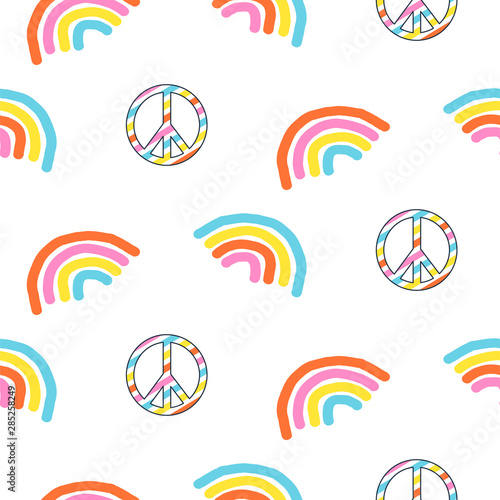 Seamless pattern with rainbow and peace symbol.