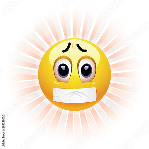 Smiling ball with mouth sealed on duct tape. Censored smiling ball.