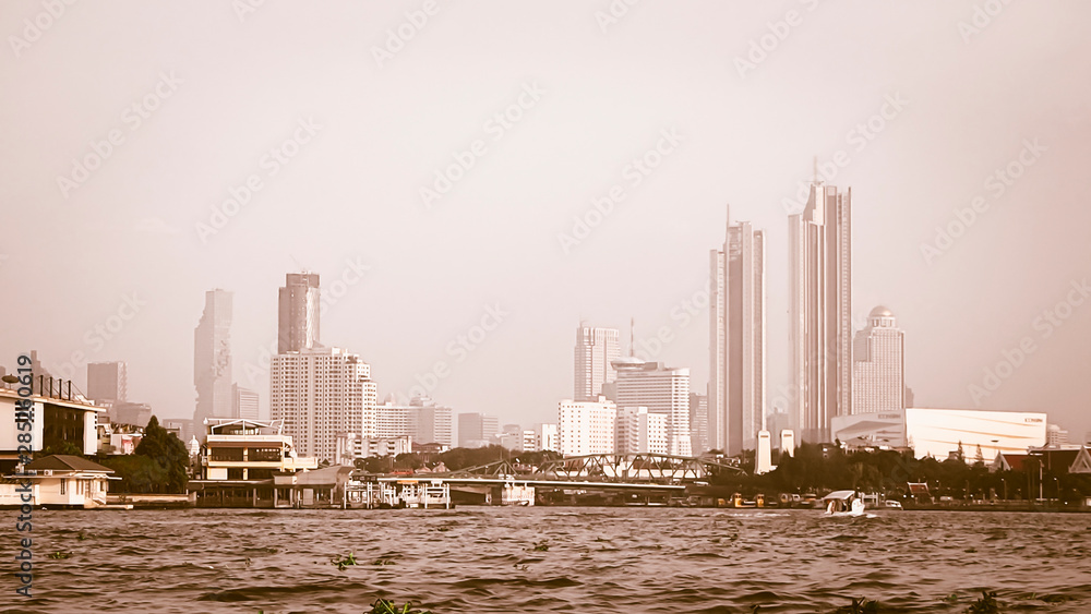 January 2019,Bangkok Thailand river of Bangkok and skyscrapper highrise building cityscape riverscape vintage tone