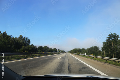 On the highway, photographed from inside the car