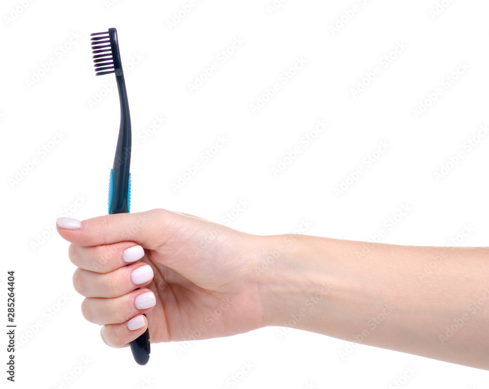 Toothbrush in hand health care on white background isolation Toothbrush in hand health care on white background isolation