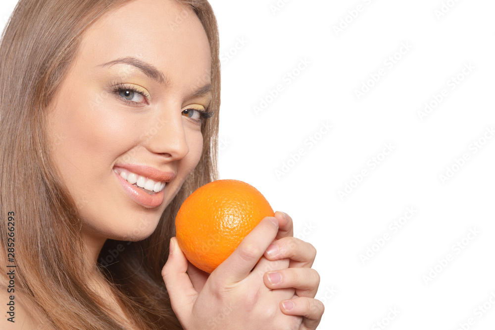 Portrait of young woman posing with orange Portrait of young woman posing with orange