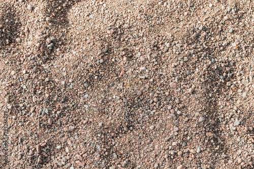 Small stones and sand of the playground