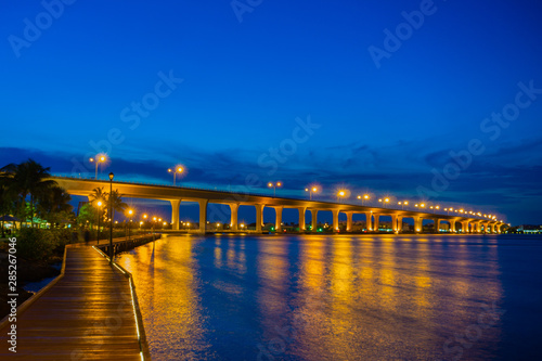 The Segmental Precast Concrete Roosevelt Bridge as seen from the Riverwalk in Downtown Stuart, Martin County, Florida, USA photo