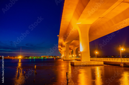 The Segmental Precast Concrete Roosevelt Bridge as seen from the Riverwalk in Downtown Stuart, Martin County, Florida, USA photo