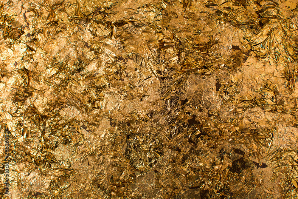 Blur Texture of the gold leaf, Gold background, Picture from Buddha image Back Blur Texture of the gold leaf, Gold background, Picture from Buddha image Back