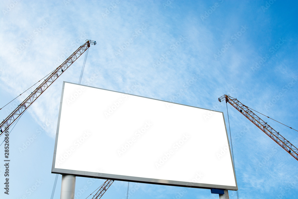 Blank Billboard with the crane on blue sky.out door advertising Blank Billboard with the crane on blue sky.out door advertising