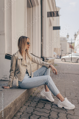 Stylish girl posing in the street. Fashion summer photo. photo
