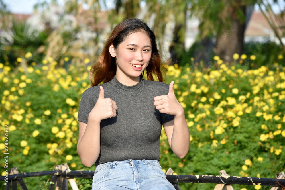 Attractive Minority Adult Female With Thumbs Up Attractive Minority Adult Female With Thumbs Up