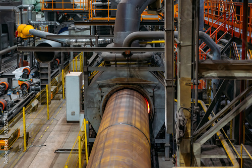 Schilderij op canvas Pipe heating in induction oven for polymer coating