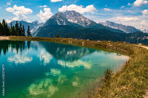 Beautiful alpine view with reflections in a lake at the famous Jenner summit near Berchtesgaden  Bavaria  Germany
