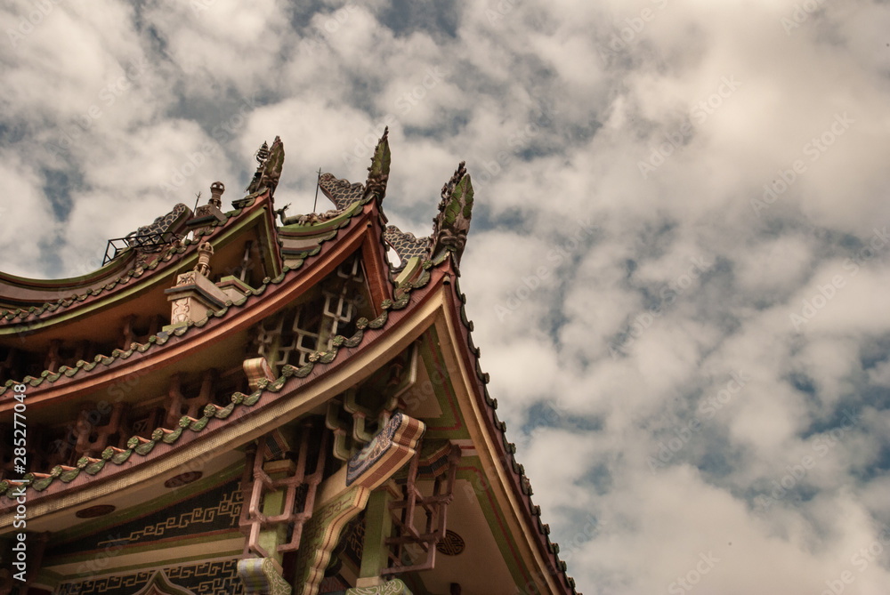 traditional patterns of the ancient Chinese Temple roof at Wat Bhoman Khunaram (Bhoman Khunaram Temple). traditional patterns of the ancient Chinese Temple roof at Wat Bhoman Khunaram (Bhoman Khunaram Temple).