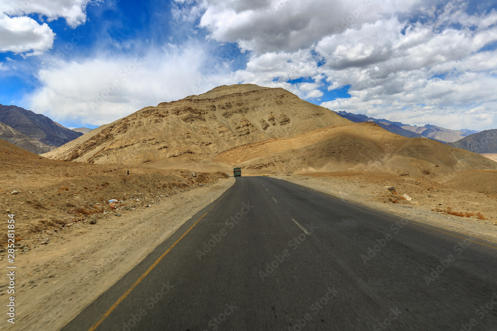 scenic landscape of road, mountain and sky in leh & ladakh, India scenic landscape of road, mountain and sky in leh & ladakh, India