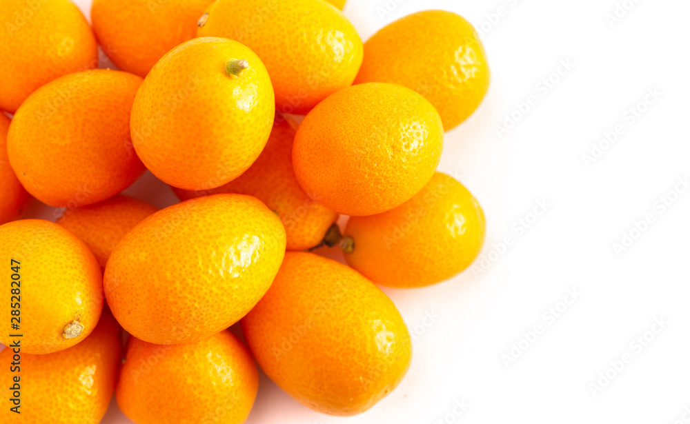 Pile of Kumquats Isolated on a White Background Pile of Kumquats Isolated on a White Background