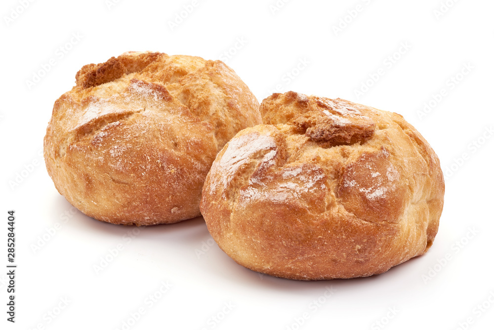 Freshly baked round homemade bread, close-up, isolated on white background