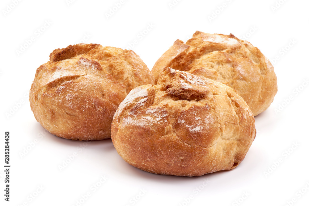 Freshly baked round homemade bread, close-up, isolated on white background