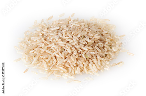 Heap of brown rice isolated on white background