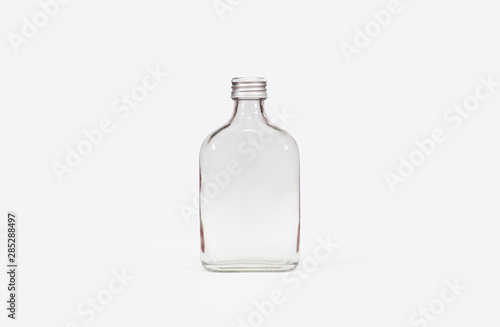 Isolated clear glass bottle white background with clipping path.