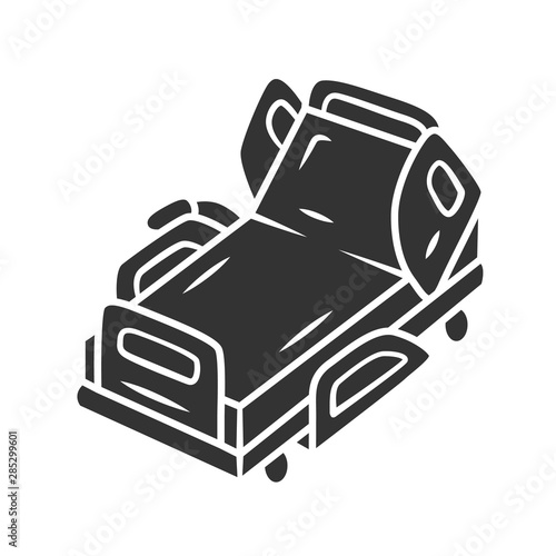 Motorized, electric hospital bed glyph icon. Device for physically disabled people. Paraplegic person treatment. Inpatient care. Silhouette symbol. Negative space. Vector isolated illustration