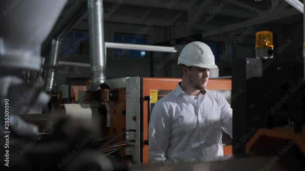 Engineer are Setting Up CNC Lathe Machine. 4K Engineer are Setting Up CNC Lathe Machine. 4K