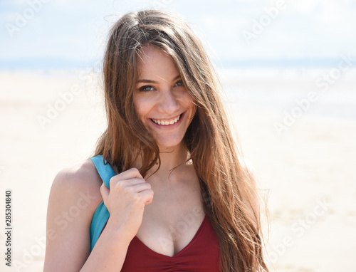 portrait of a beautiful young woman on the beach