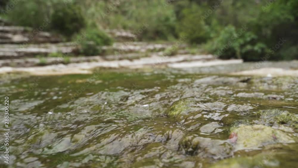 River stream flows in slow motion in Nature Reserve Cavagrande, Sicily River stream flows in slow motion in Nature Reserve Cavagrande, Sicily