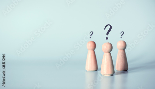 Three people with a question mark icon on blue background, copy space.