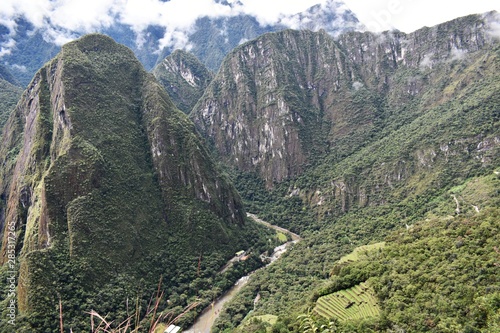 View of Urubamba river and the hill Putucusi, Peru  photo