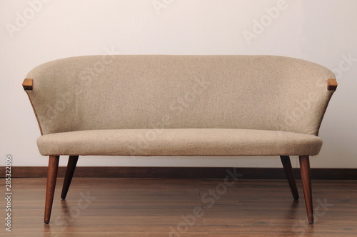 Fototapeta Naklejka Na Ścianę i Meble -  Upholstered vintage armchair, wool, grey fabric, old style, danisch design, denmark