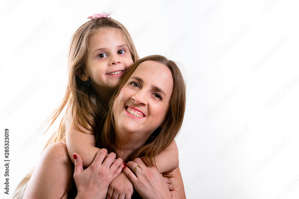 Happy mother's day! Child daughter congratulates moms and giving a tight hug. White background, copy space. Happy mother's day! Child daughter congratulates moms and giving a tight hug. White background, copy space.