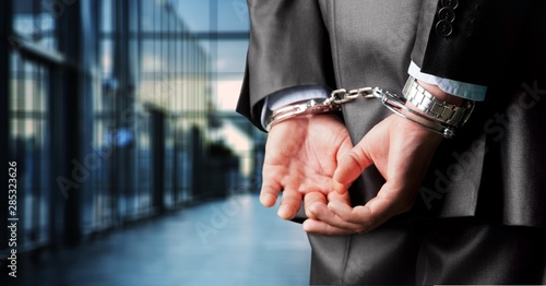 Fotografiet Arrest bound bracelet bribe bribery business businessman