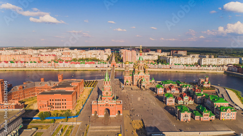 View of the Cathedral of the Annunciation of the Blessed Virgin Mary with a monument Yoshkar Ola city. Mari El, Russia.
