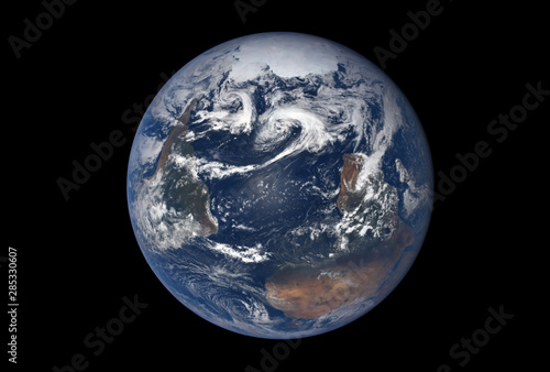 Fototapeta Naklejka Na Ścianę i Meble -  Planet earth, with cyclones and the ocean, on a dark background. Elements of this image were furnished by NASA