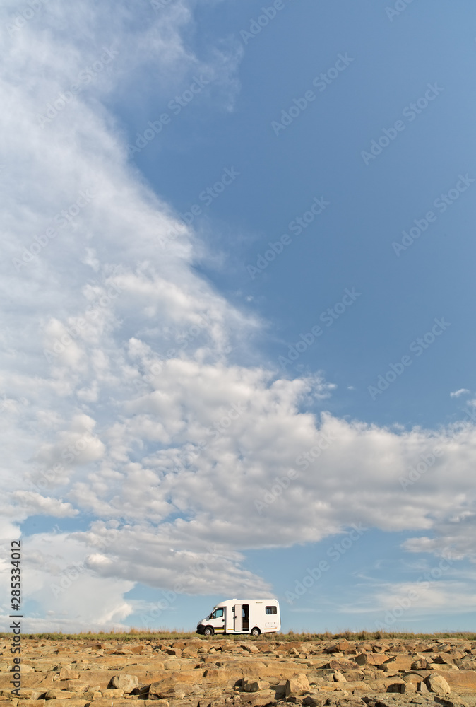 A mobile home beneath the vast African sky A mobile home beneath the vast African sky