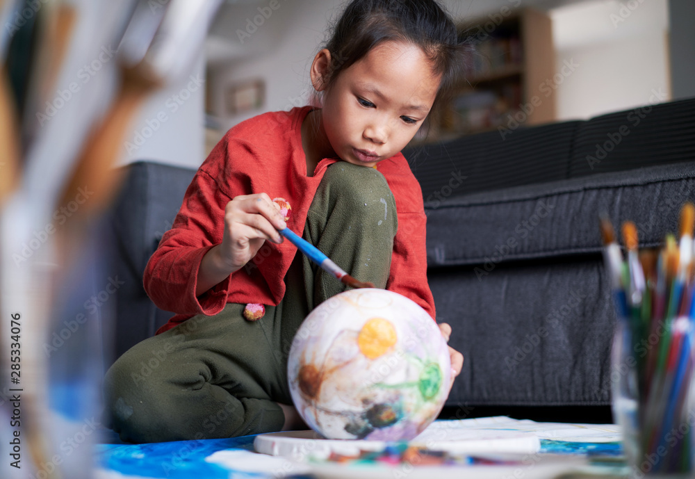 Asian children make artistic paintings at home Asian children make artistic paintings at home
