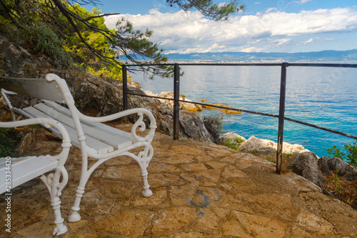 Fototapeta Naklejka Na Ścianę i Meble -  Bench on the beach of Adriatic sea in Croatia