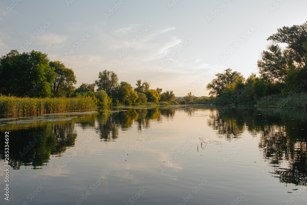 Fototapeta premium Landscape of nature series. Sunset time on the river.