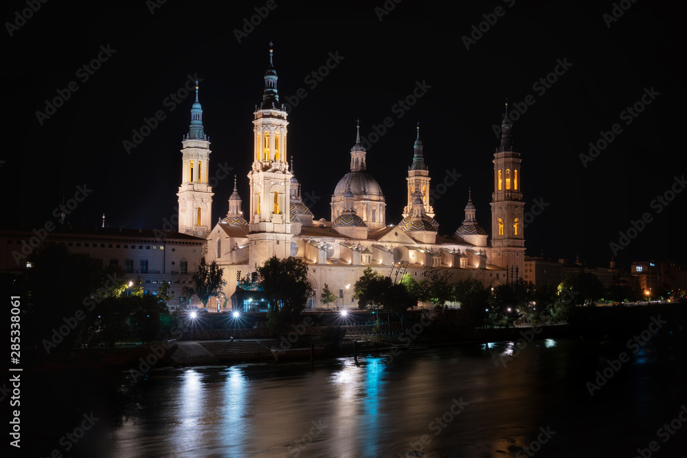 Night View Of The Basilica Of The Virgen Del Pilar And Ebro River, Zaragoza, Aragon, Spain .