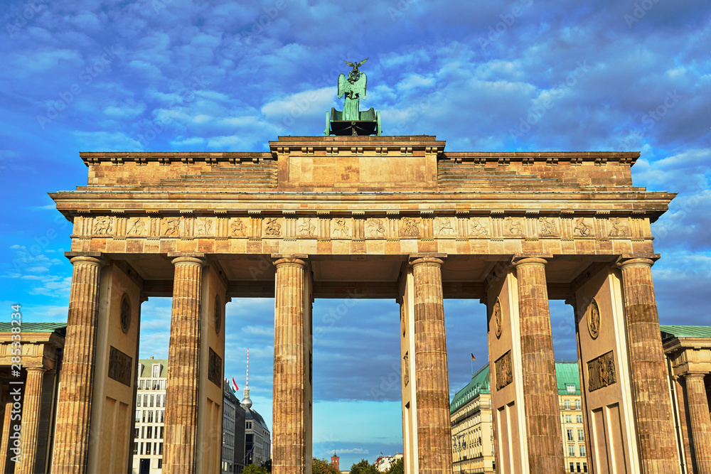 Fototapeta premium quadriga with the goddess of victory Victoria at the top of the monumental Brandenburg Gate in Berlin.
