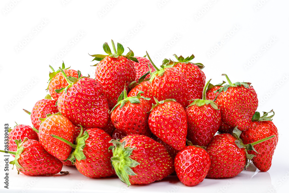 beautiful and ripe red strawberries on a white background beautiful and ripe red strawberries on a white background