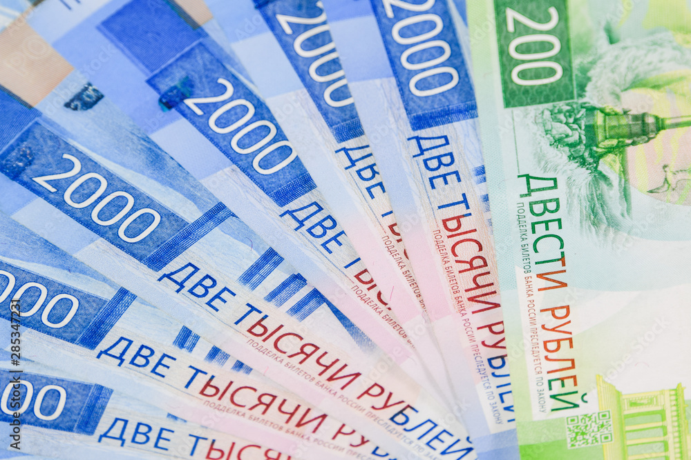 Russian new denominations of 2000 and 200 rubles. Russian banknotes. Russian money is ruble Russian new denominations of 2000 and 200 rubles. Russian banknotes. Russian money is ruble