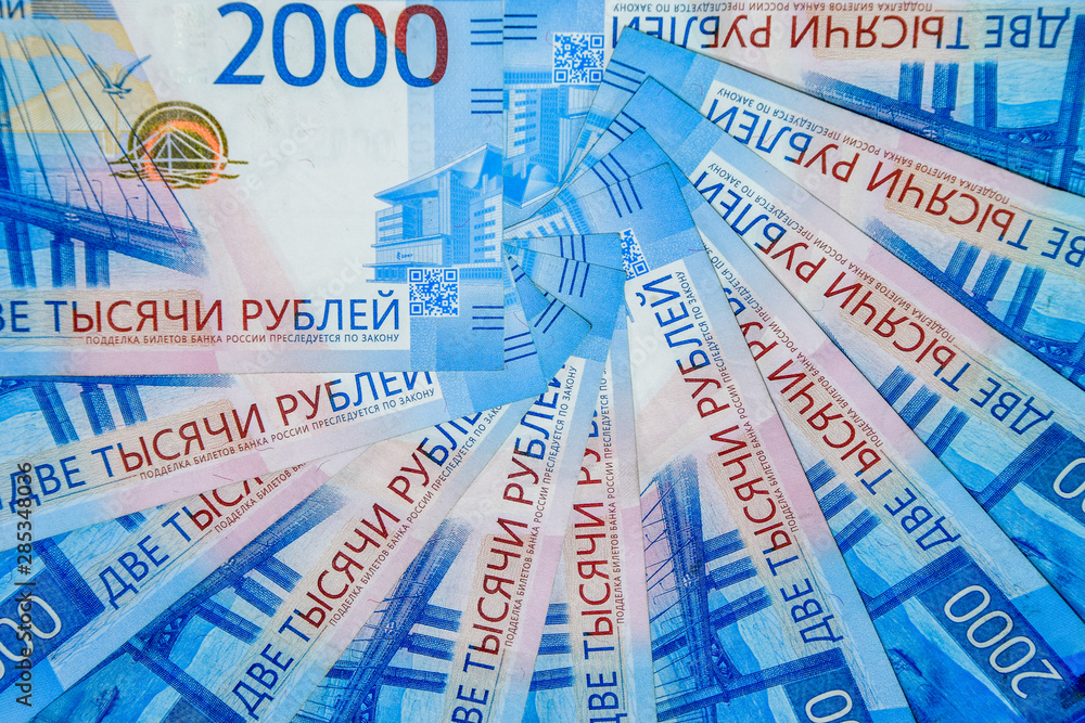 Fototapeta premium Russian money banknotes in nominal value of two thousand. New tickets of the bank of Russia. Russian money.