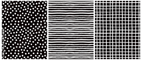 Hand Drawn Childish Style Vector Patterns. White Stripes on a Black Background. White Grid On a Back Layout. White Polka Dots on a Black. Cute Simple Childlike Geometric Design.